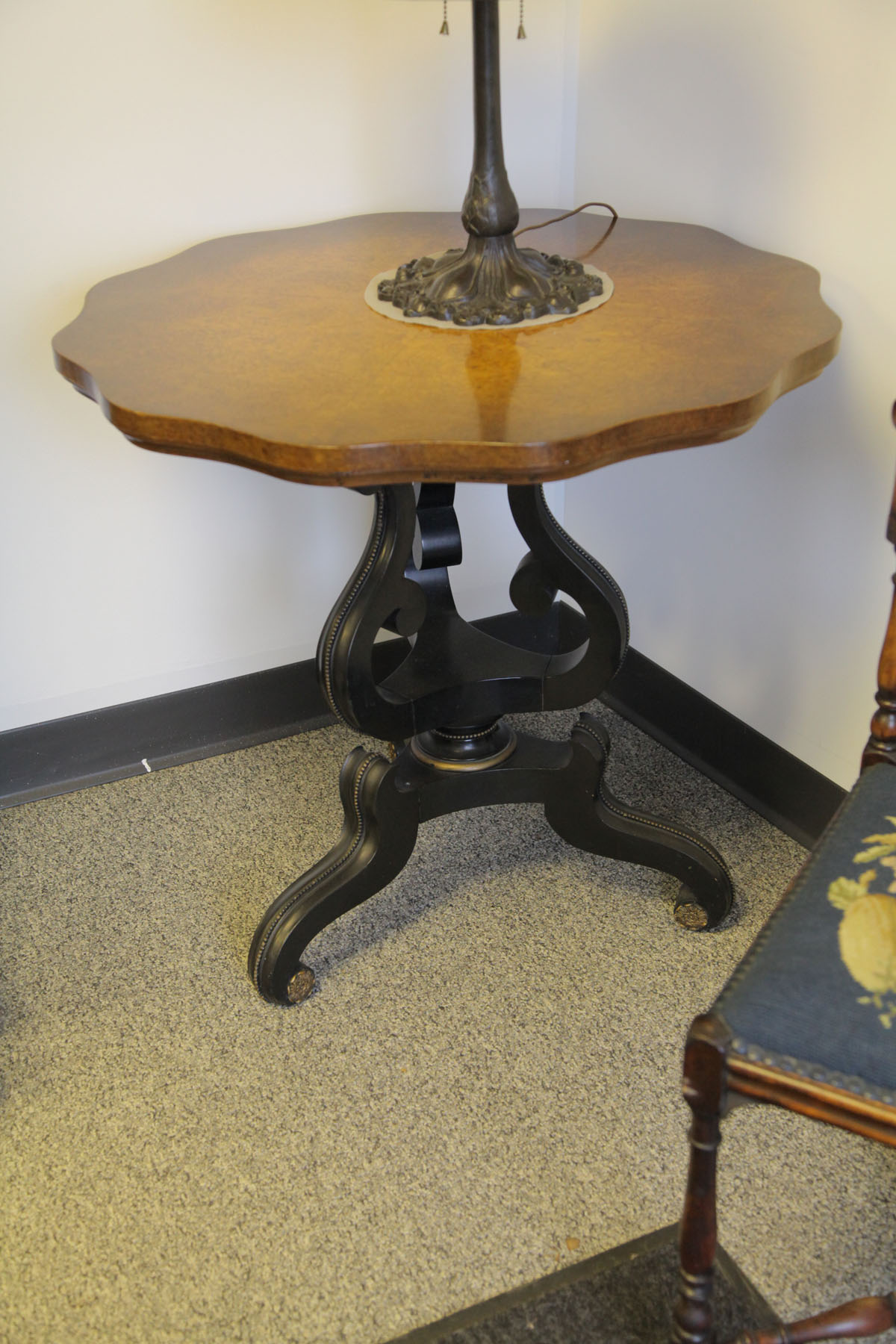 Appraisal: LAMP TABLE American th century Faux birdseye floriform top black