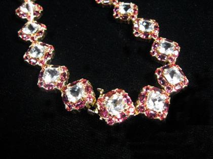 Appraisal: Pair of karat yellow gold white topaz and pink sapphire