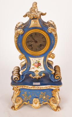 Appraisal: A Paris porcelain cased mantel clock the silvered dial with