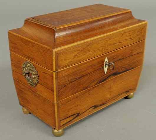 Appraisal: Rosewood tea caddy th c with a sarcophagus top As