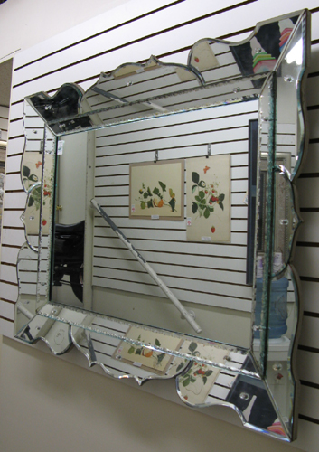 Appraisal: A LARGE AMERICAN RECTANGULAR WALL MIRROR with shaped mirror frame