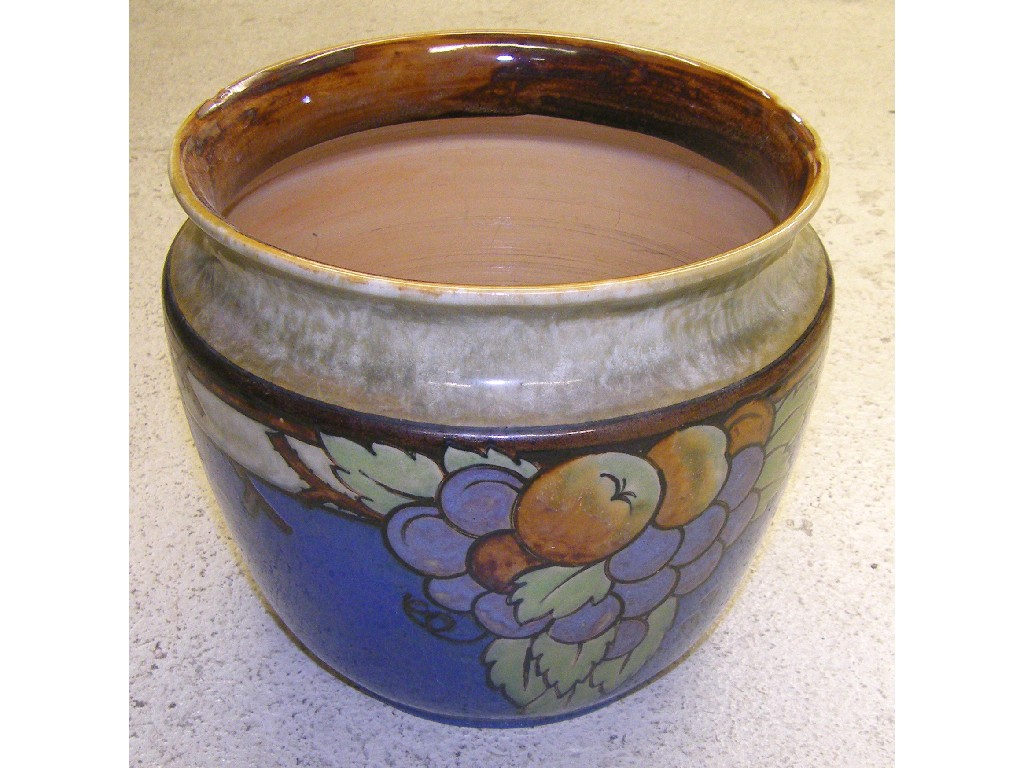 Appraisal: Royal Doulton stoneware jardiniere decorated with fruits on a mottled