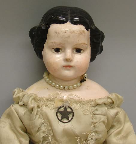 Appraisal: Blue stamp Holz-Masse papier mache shoulderhead doll with brown eyes