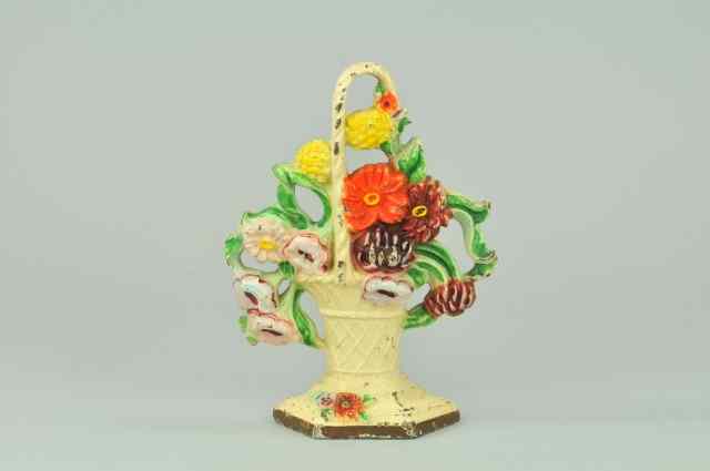 Appraisal: DAHLIAS DOORSTOP Hubley marked cast iron vibrant and varied colored