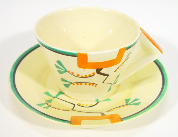 Appraisal: Clarice Cliff Bizarre cup and saucer with angular handle hand