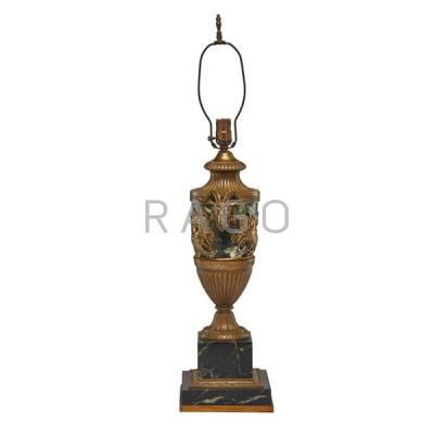 Appraisal: CONTINENTAL BRONZE AND MARBLE TABLE LAMP Mythological scenes ram s