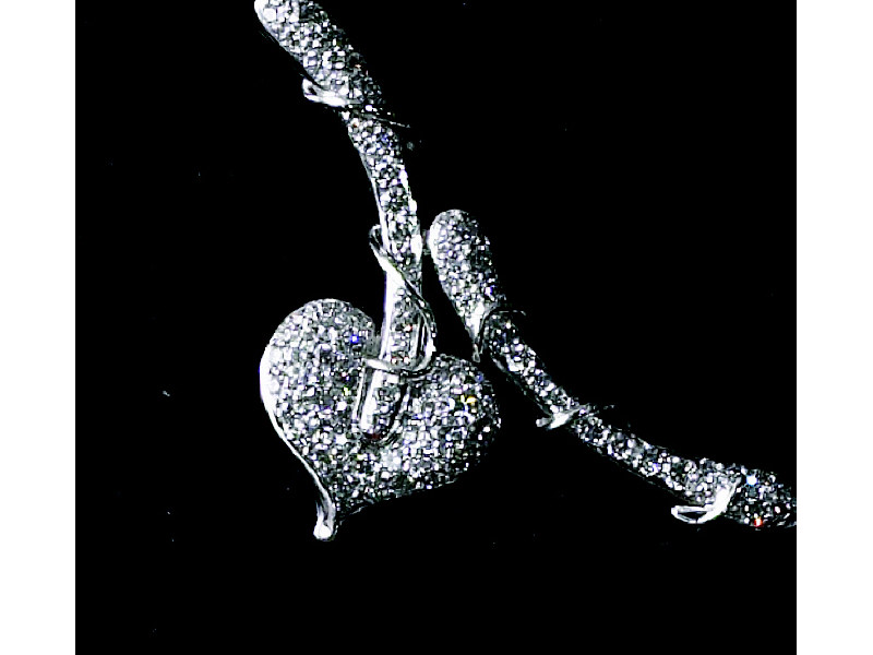 Appraisal: DIAMOND HEART NECKLACE k white gold freeform design necklace with