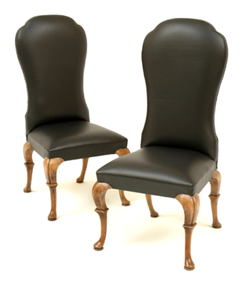 Appraisal: A PAIR OF GEORGE I STYLE FRUITWOOD AND LEATHER ARMCHAIRS