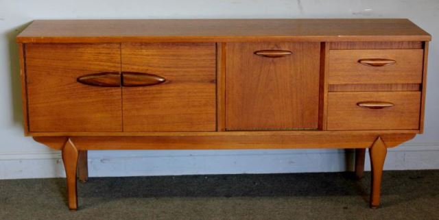 Appraisal: Midcentury Danish Sideboard Door and drawer with flat oval pulls