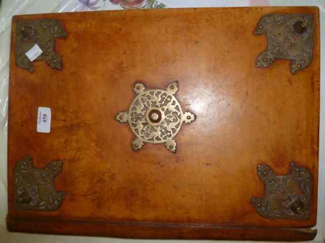 Appraisal: A VICTORIAN FOLDING BLOTTER with leather mounts and brass fittings