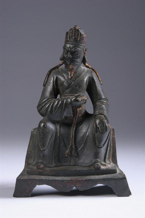 Appraisal: CHINESE BRONZE FIGURE OF SCHOLAR th century Seated on D-form