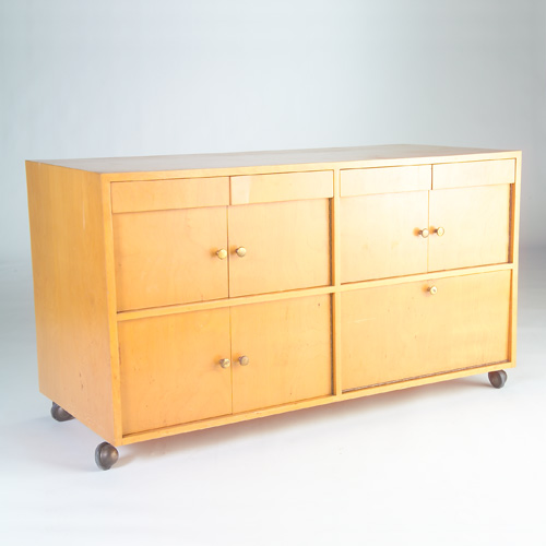 Appraisal: MODERN Blonde-wood buffet with four drawers over four cabinets one