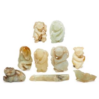 Appraisal: GROUP OF JADE CARVINGS Nine Foo dog falcon pendant bamboo