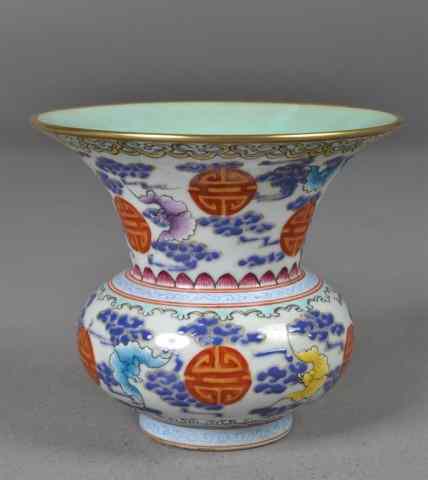 Appraisal: Chinese Famille Rose Spitoon Enamelled VaseSpitoon-shaped footed vase with overall