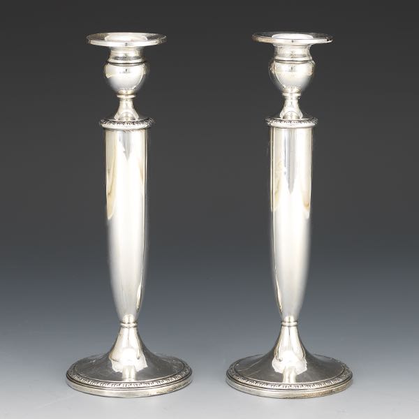 Appraisal: PAIR OF STERLING SILVER CANDLEHOLDERS Weighted sterling candleholders marked on