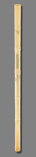 Appraisal: A carved ivory bamboo-form cigarette holder By Wu Nan Ze