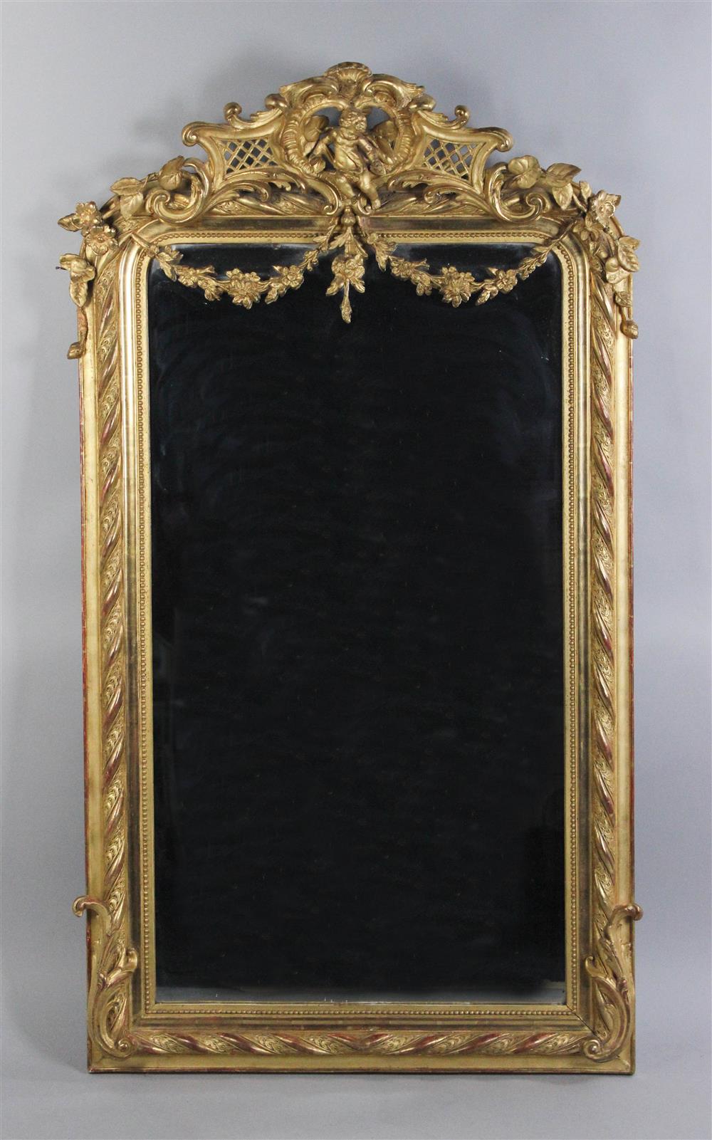 Appraisal: LOUIS XV STYLE GILTWOOD PIER MIRROR circa rectangular with putto