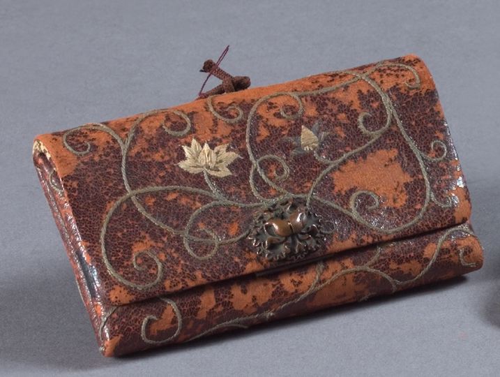 Appraisal: Japanese Meiji Copper-Clasped Embroidered Leather Double-Compartment Tobacco Pouch fourth quarter