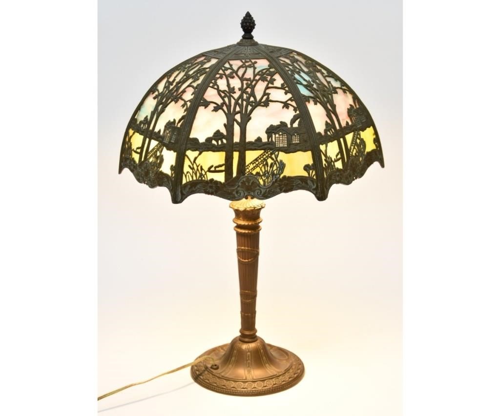 Appraisal: Patinated bronze metal table lamp with slag glass shade circa