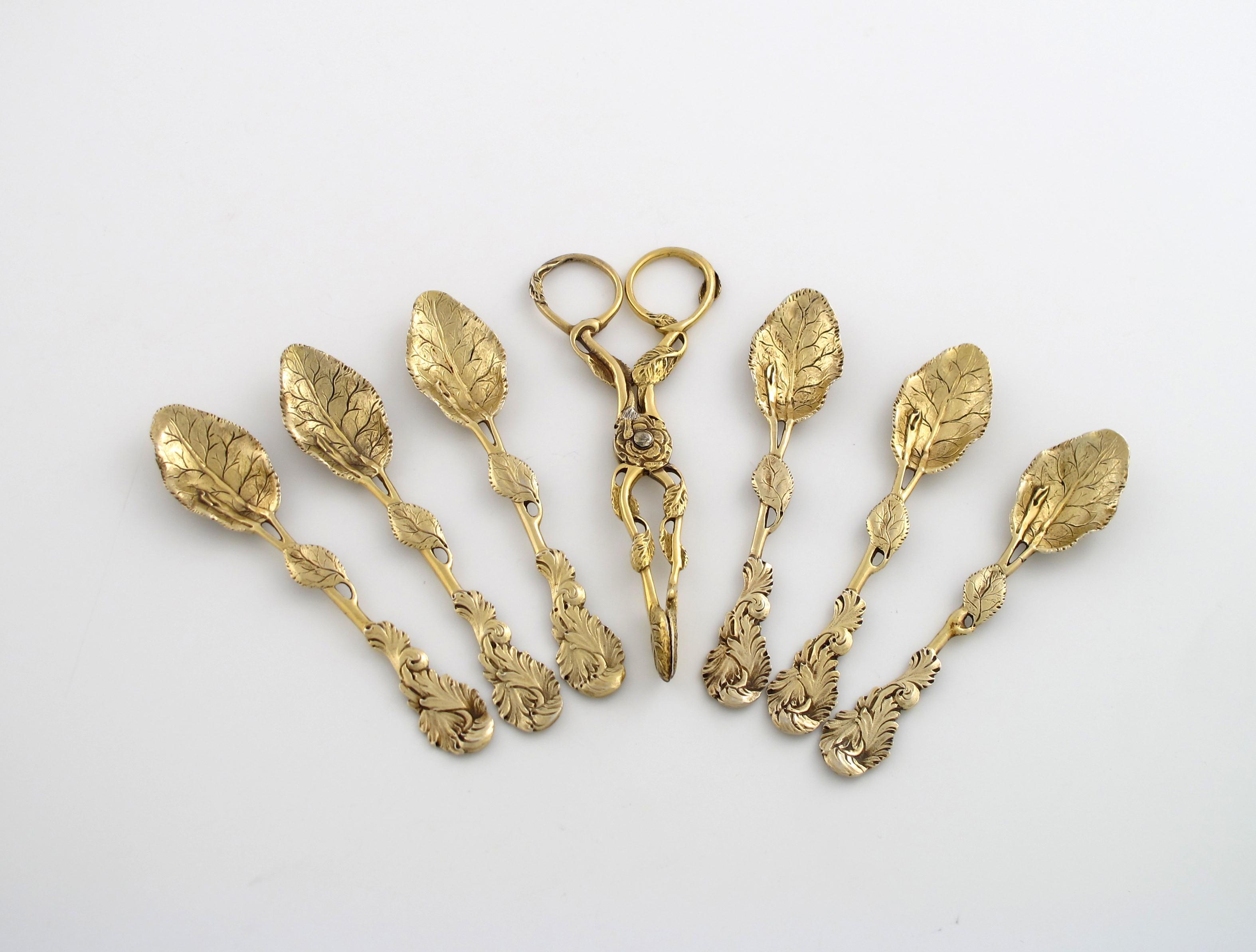 Appraisal: A set of six th century cast silver-gilt naturalistic teaspoons