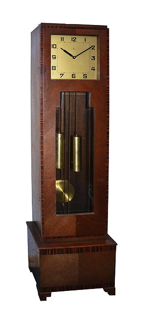 Appraisal: AN ART DECO LONGCASE CLOCK with rectangular silvered dial twin