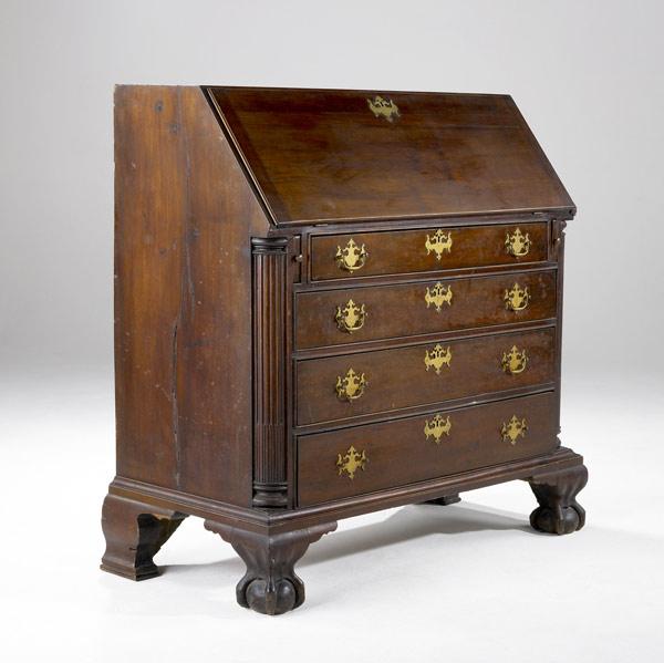 Appraisal: AMERICAN DESK Walnut slant front with brass pulls ca -