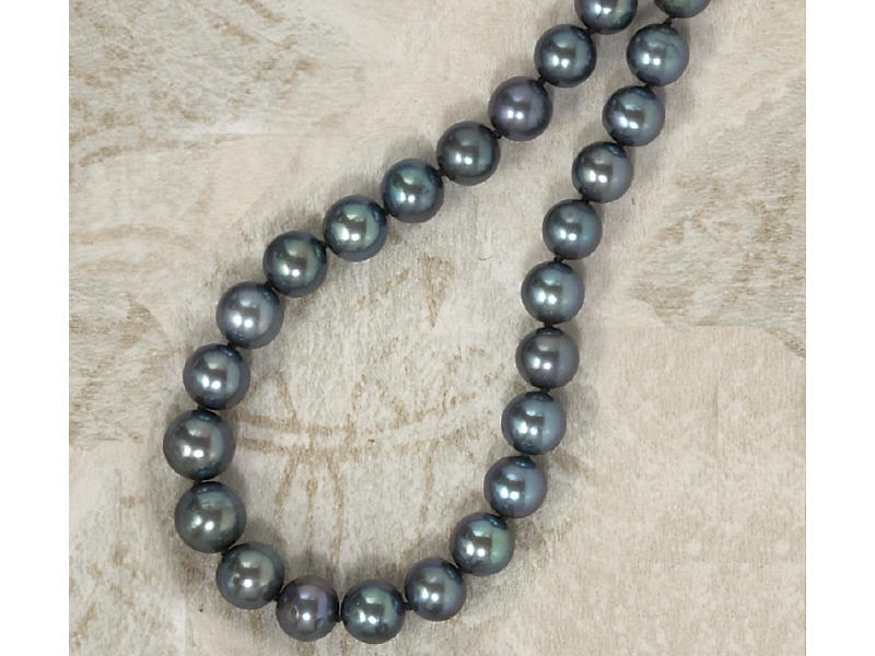 Appraisal: BLACK PEARLS Cultured pearls measuring mm - mm with k