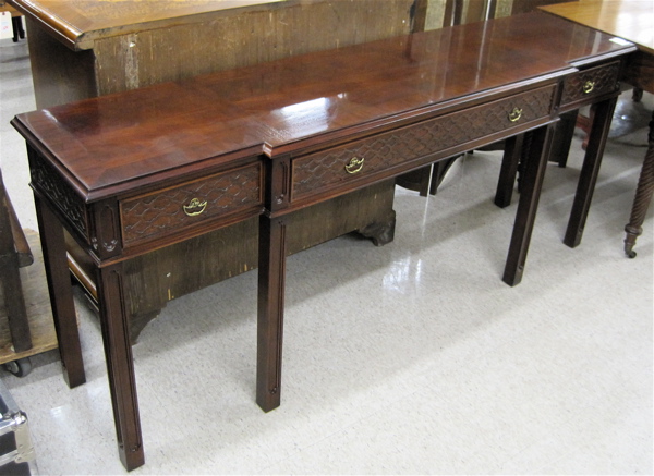 Appraisal: CHIPPENDALE STYLE MAHOGANY FRET RIM SOFA TABLE model - Century