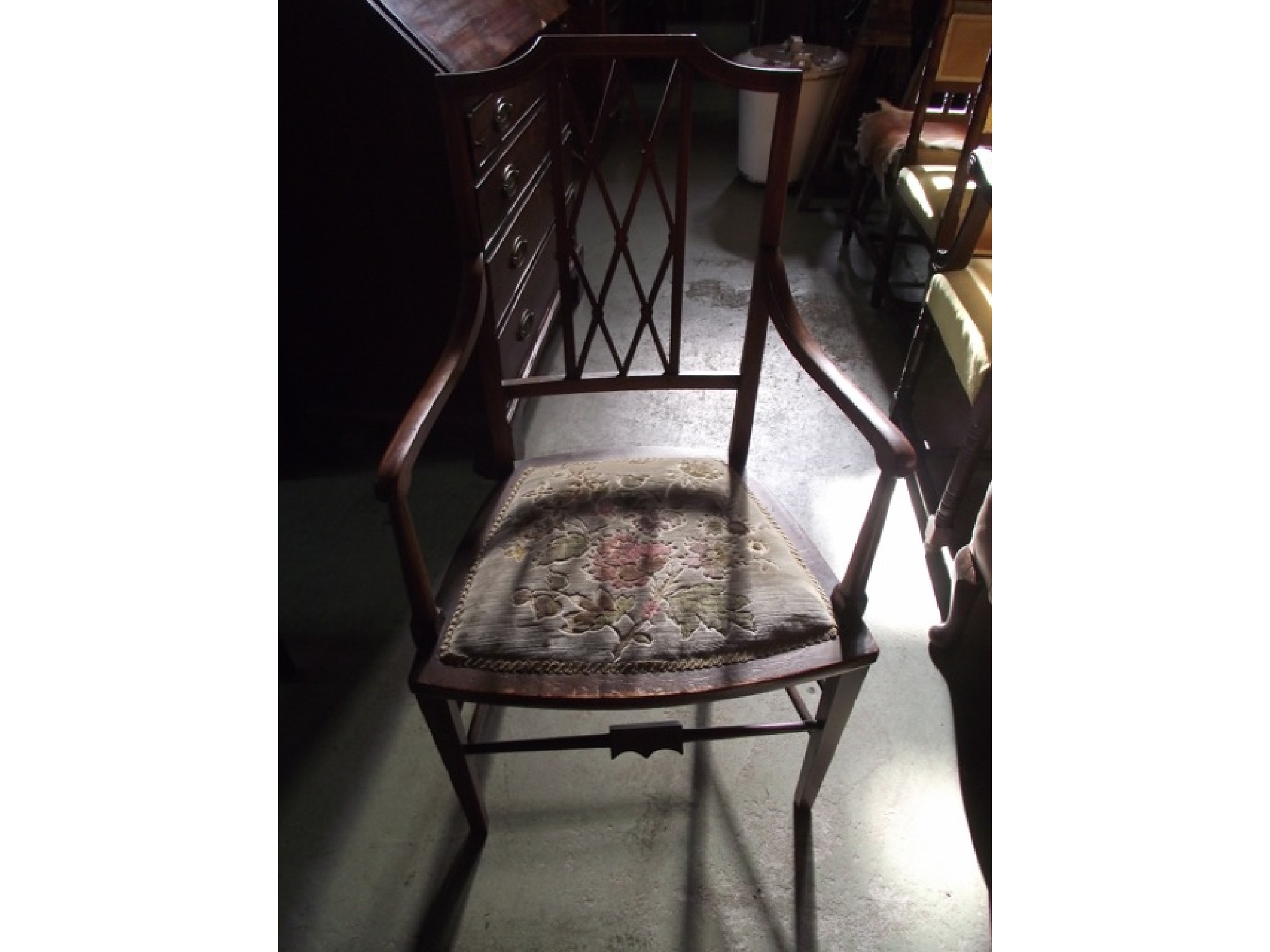 Appraisal: A vintage child's oak elbow chair with vertical slats over