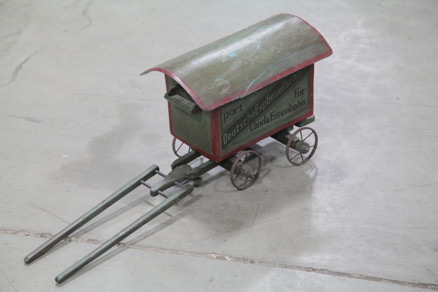 Appraisal: CHILD'S COVERED WAGON American early th century Green and red