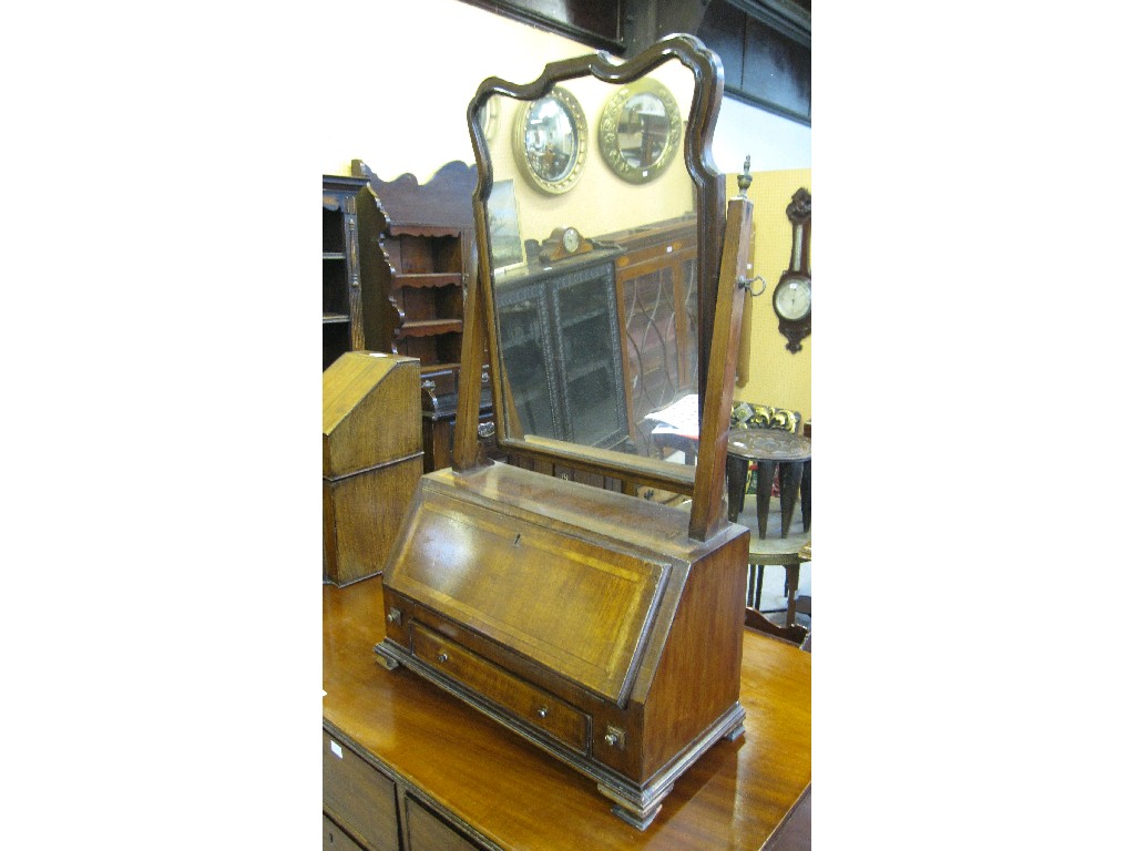 Appraisal: Edwardian mahogany toilet mirror with fitted interior