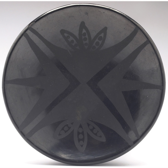 Appraisal: San Ildefonso plate highly polished finish with black-on-black design signed