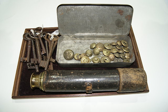 Appraisal: A COLLECTION OF KEYS assorted military buttons and a Victorian