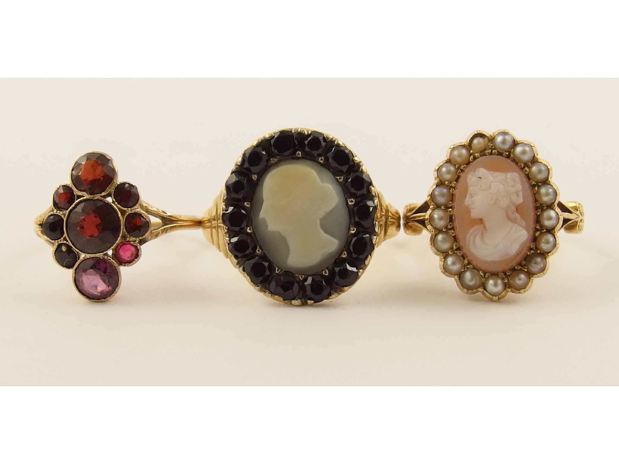 Appraisal: An ct glass cameo ring set with split pearlsa ct