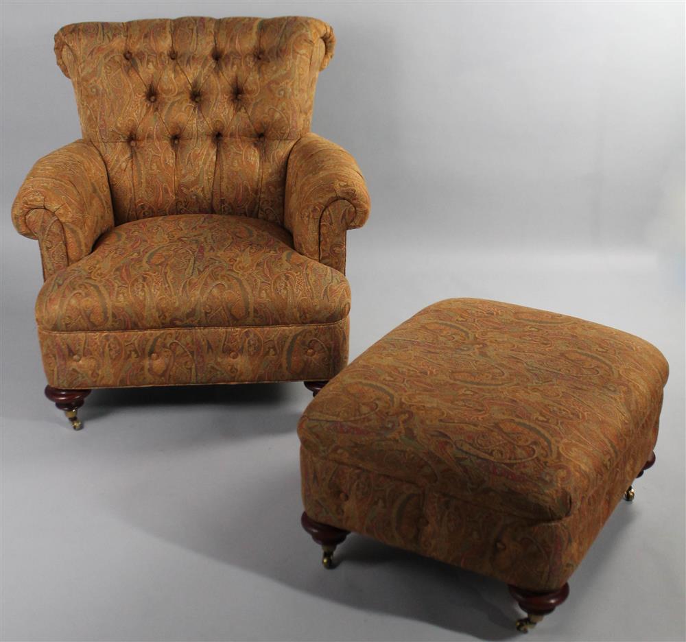 Appraisal: EDWARDIAN STYLE PAISLEY UPHOLSTERED LIBRARY CHAIR WITH MATCHING OTTOMAN having