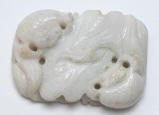 Appraisal: Chinese Carved White Jade Amulet Jadeite jade depicting leaves and