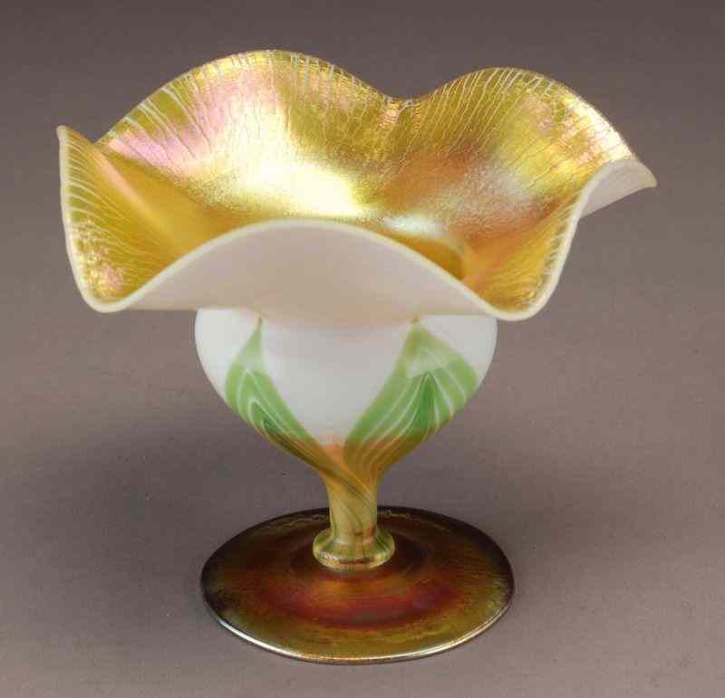 Appraisal: Tiffany decorated Favrile glass flower formfooted compote the iridescent gold