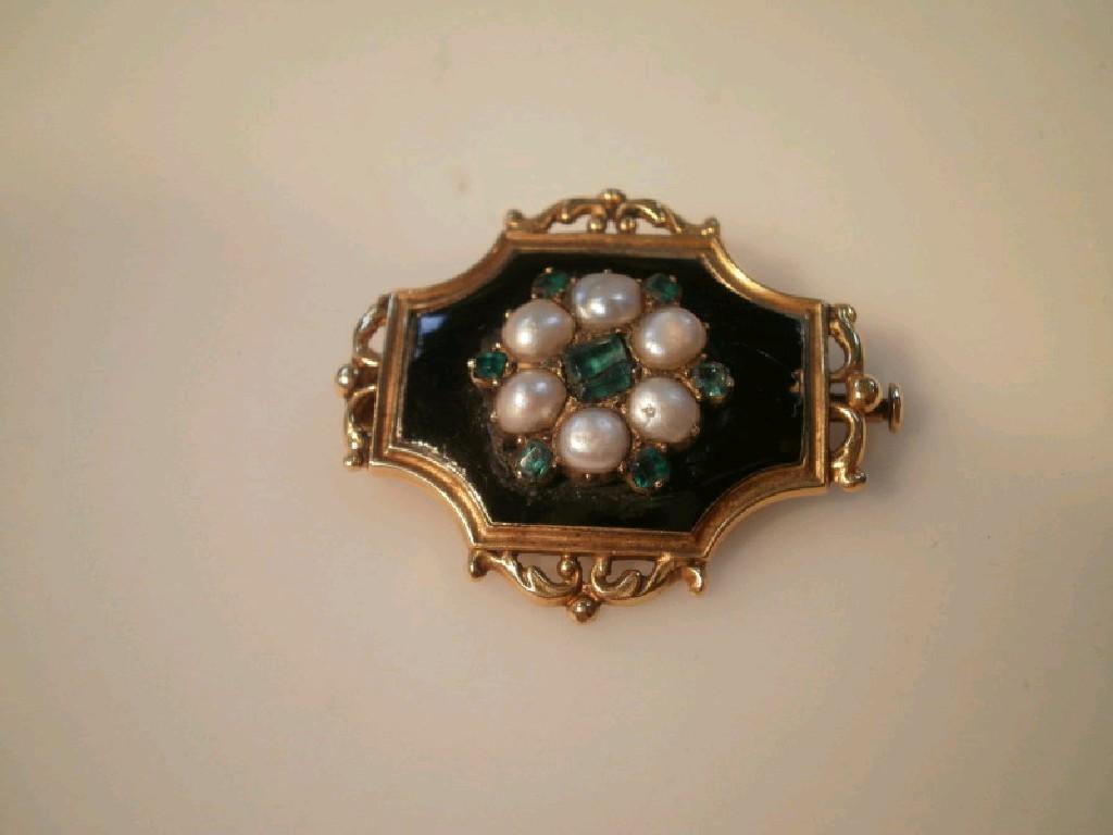 Appraisal: A Victorian mourning brooch black enamelled plaque set with a