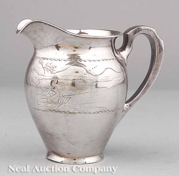 Appraisal: A Chinese Export Silver Cream Jug th c urn-form engraved