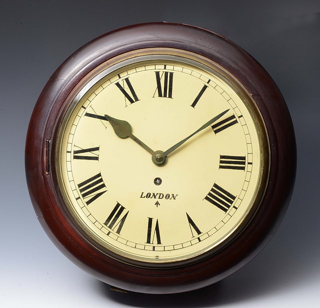 Appraisal: AN ENGLISH DIAL TIMEPIECE the white Roman dial inscribed London