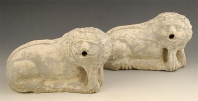 Appraisal: A pair of carved stone models of lions drilled fountain