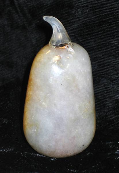 Appraisal: A nephrite pebble form snuff bottle Of irregular form and