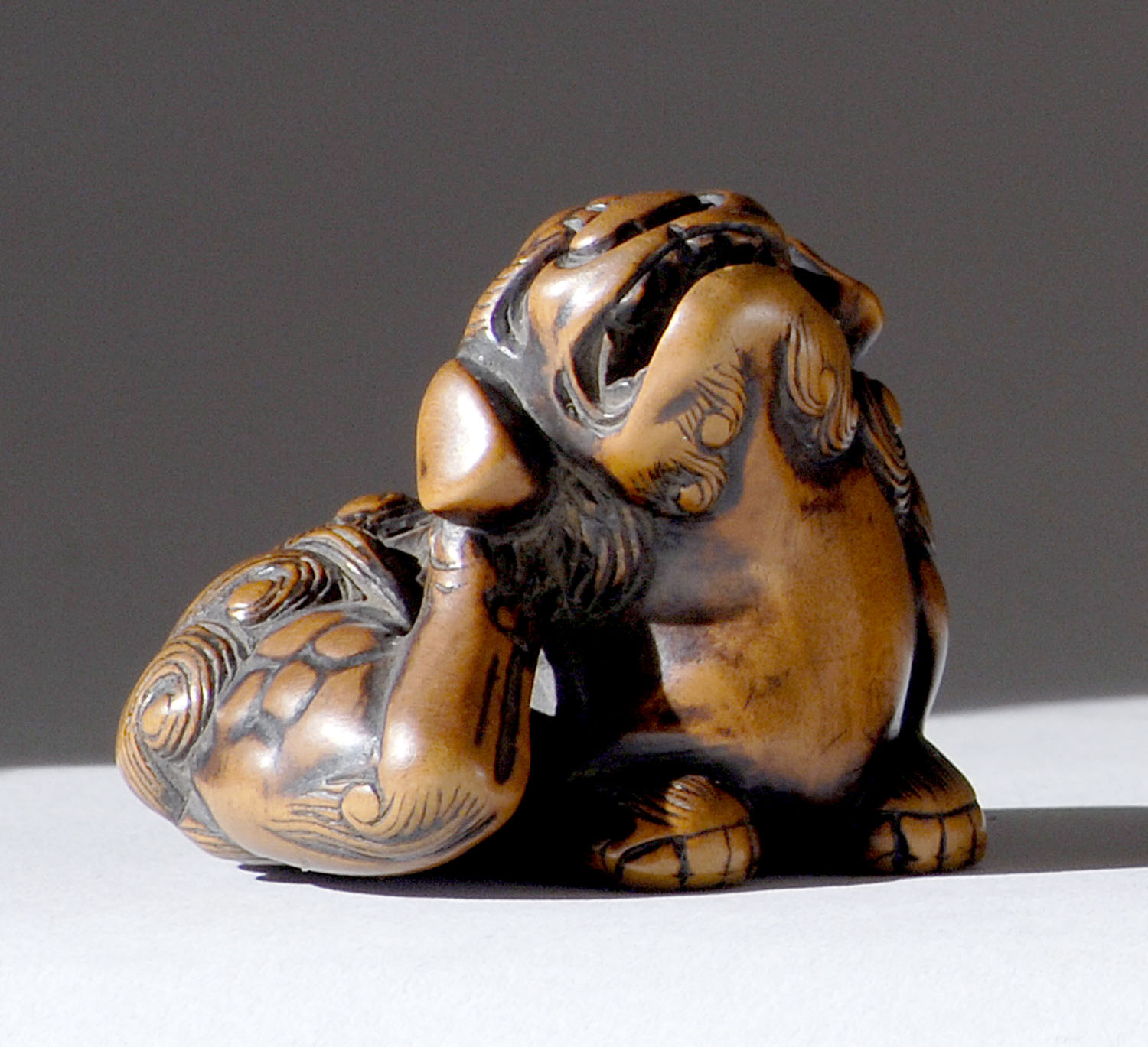 Appraisal: WOOD NETSUKE Early th CenturyIn the form of a shishi