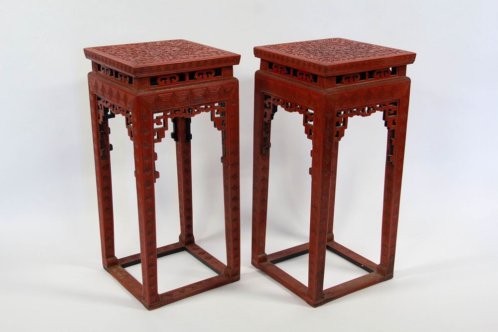 Appraisal: A Pair of Carved Cinnabar 'Dragon' Incense Stands th century