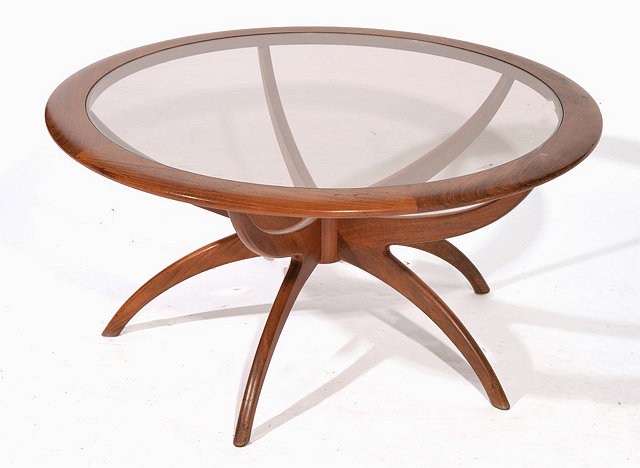 Appraisal: AN G PLAN TEAK CIRCULAR COFFEE TABLE with inset glass