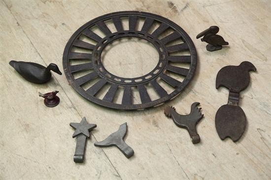 Appraisal: EIGHT PIECES OF CAST IRON Five shooting targets '' to