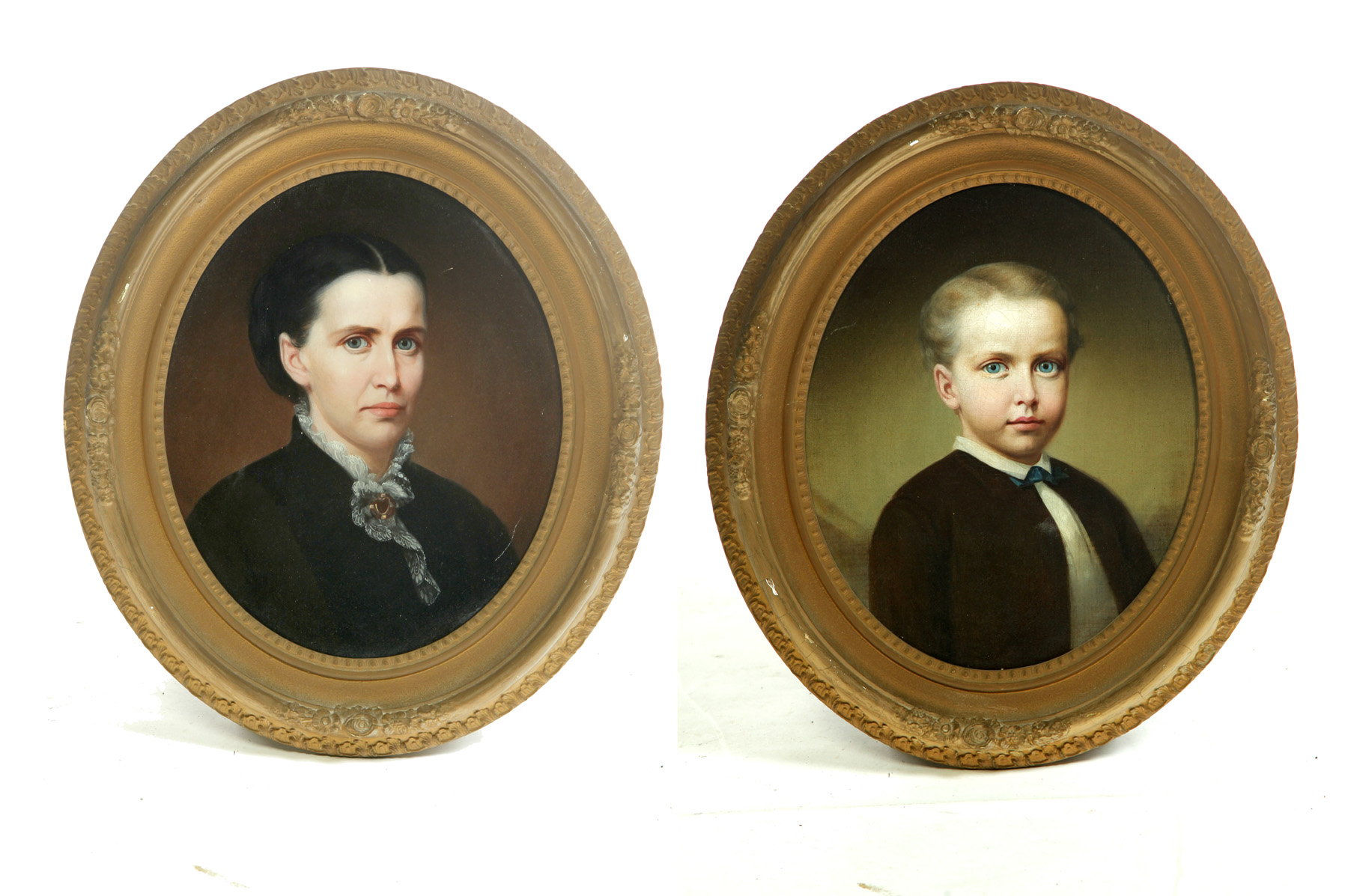 Appraisal: TWO FRAMED OVAL OIL ON CANVAS PORTRAITS American rd quarter-