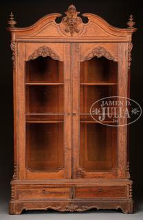 Appraisal: ROCOCO REVIVAL CARVED OAK BOOKCASE Third quarter th century possibly