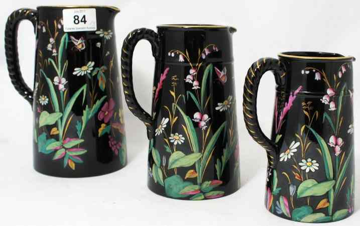 Appraisal: Jack Fields Stoneware Hand Painted Water Jugs decorated with Butterflies