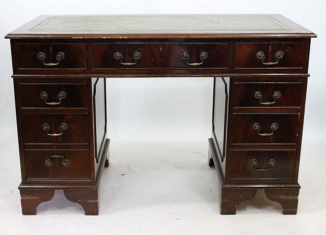 Appraisal: A TH CENTURY REPRODUCTION TWIN PEDESTAL DESK leather inset top